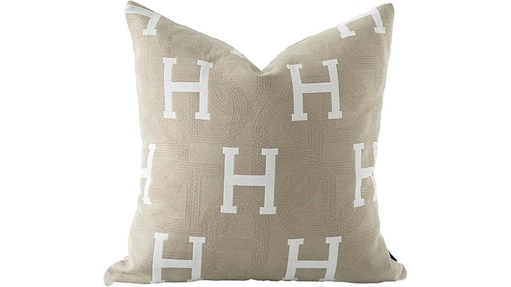 large beige embroidered letter